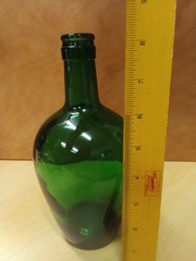 This green glass demijohn bottle