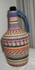 Vintage COLORFUL Plastic Wicker Wrapped Glass Bottle Handled Decanter