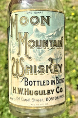 RARE ANTIQUE ORIGINAL  » MOON MOUNTAIN WHISKEY  » PAPER LABEL EMPTY BOTTLE ! NICE