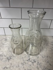 Set of two clear glass Paul Mason carafes with « Since 1852 » embossed marking.
