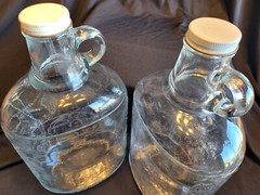 Vintage Rare Embossed Half Gallon Little Amana Glass Wine Jug(2) With Lids