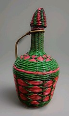 Vintage Green Viresa Glass Bottle Wrapped In Colorful Plastic Wicker 9.5” Tall