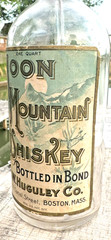 RARE ANTIQUE ORIGINAL  » MOON MOUNTAIN WHISKEY  » PAPER LABEL EMPTY BOTTLE ! NICE