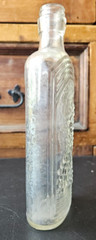 WINE 372, KNOX GLASS CO. ONE PINT FLASK. . EMBOSSED GRAPES, K IN KEYSTONE MARK