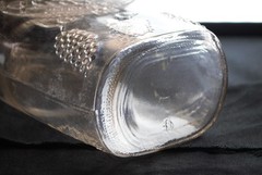 Vintage Garrett&rsquo;s American Wines embossed clear 1 quart wine bottle grapes