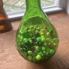 Green Glass Wine Bottle with Cap, Filled with Assorted vintage Marbles Inside