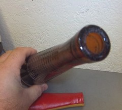 Vintage unusual bottle with leather covering, cool collectible, 11 x 3 inches