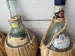 Splendid vintage collection of empty Italian Chianti flascas and ceramic jags