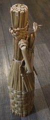 Vintage Wine Bottle Cover Wicker 18” Tiki Statue Playing Instrument