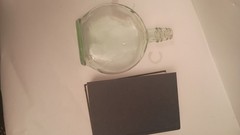 Vintage Clear Glass Round Bottle Collectible Decorative Container