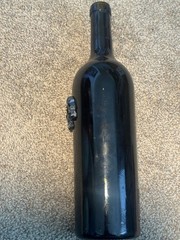 Rare empty bottle of wine The Resurrection (Napa Valley) with a skull