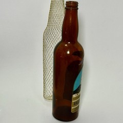 Vintage Pagoda Plum Wine “EMPTY” Bottle Mesh Covering Collectible