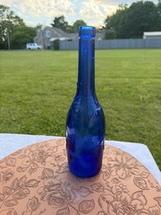 Vintage AM Cobalt Blue Glass Wine Bottle with Embossed Grapes and Leaves