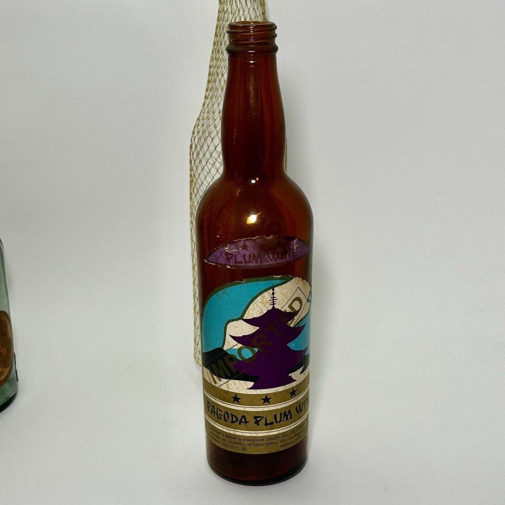 Vintage Pagoda Plum Wine “EMPTY” Bottle Mesh Covering Collectible