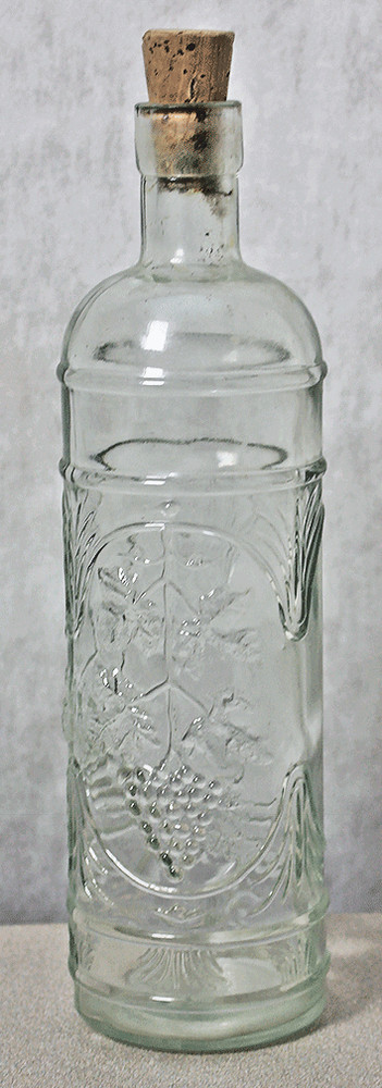 grape vine wine bottle made in Spain good condition with cork