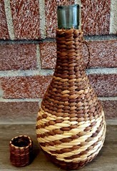 Wicker Wrapped Clear Bottle With Wicker Top 11&Prime;