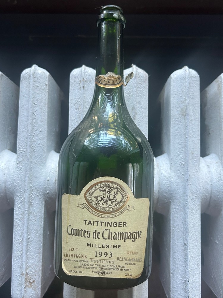 Empty bottle of 1993 Taittinger Comtes de Champagne Millésime Blanc de Blancs