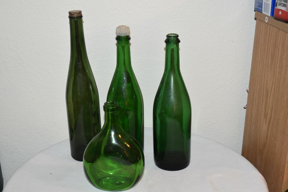 4 Vintage green glass Empty assorted bottles tall and short craft EUC