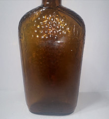Vintage 1930&rsquo;s Brown Embossed Grape & Leaf & Vine One Pint Wine Bottle Wine Oval