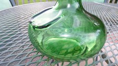 Vintage L.J. McGuinness co. Green wine bottle made in Canada 9&Prime; tall