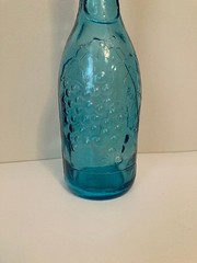 AM Turquoise Embossed Grapes and Leaves Glass Wine Bottle 11 3/4&Prime; Tall