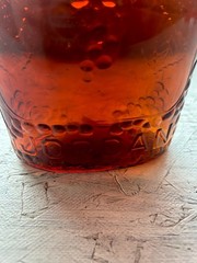 Jordan Amber Wine Bottle with Embossed Grapes Motif Vintage 1920’s