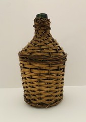 Rustic Wicker Wrapped Green Glass Bottle with a Handle VTG