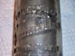 (A15) Vintage – Embossed Virginia Dare Clear Glass Wine Bottle – Size 1 5/8 pt
