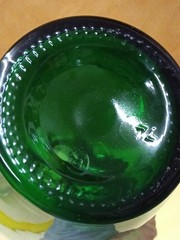This green glass demijohn bottle