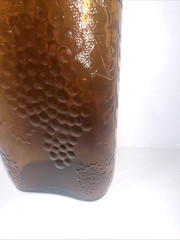 Vintage 1930&rsquo;s Brown Embossed Grape & Leaf & Vine One Pint Wine Bottle Wine Oval