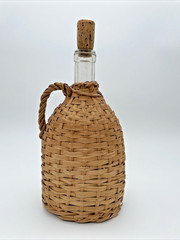Vintage Rattan Wicker Wrapped Liquor Wine Bottle w/ Handle and Stopper 10&Prime; Empty