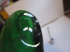 Vintage Green blown Glass 9.5&Prime; WINE Bottle W/13&Prime; WROUGHT IRON LEAF DESIGN