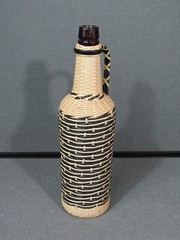 Vintage 70s Plastic Tube Weave Black & White Glass Bottle