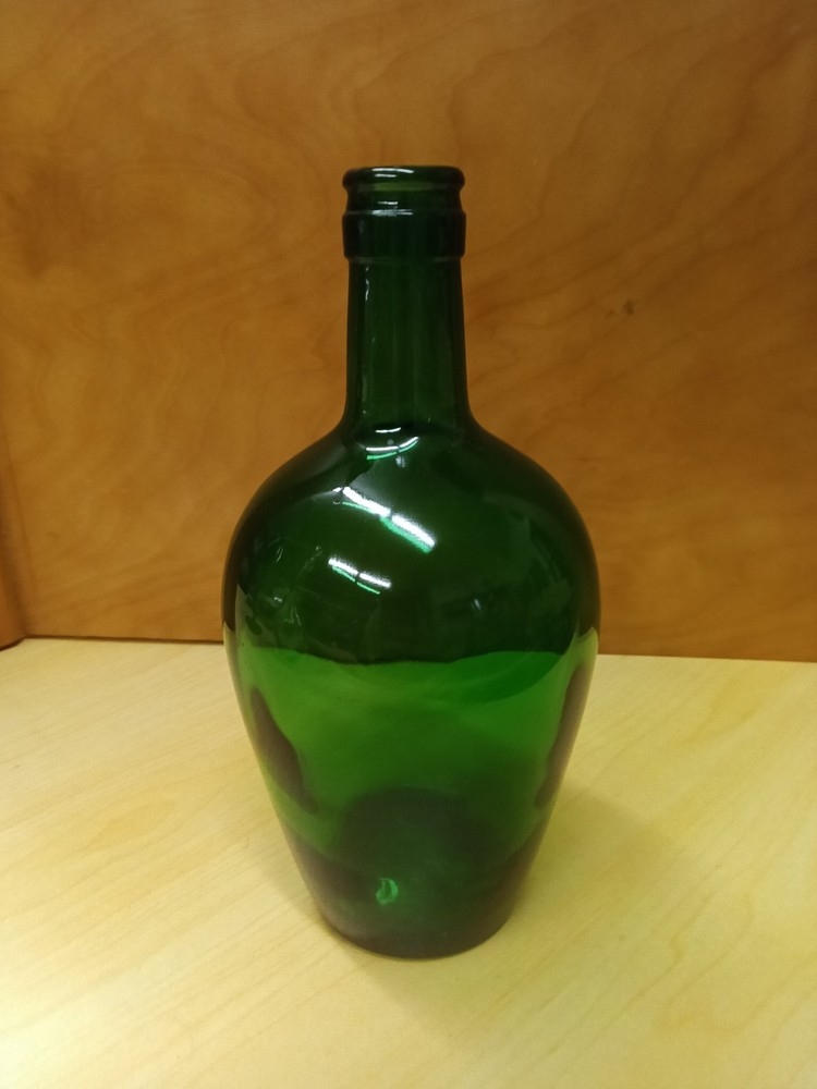 This green glass demijohn bottle