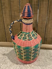 Vintage Green Viresa Glass Bottle Wrapped In Colorful Plastic Wicker 9.5” Tall