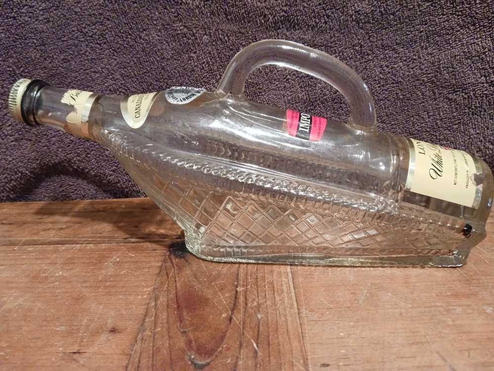 Vintage LONDON WINERY LTD Empty Clear Horizontal Bottle in Basket/Ship w/Handle
