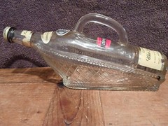 Vintage LONDON WINERY LTD Empty Clear Horizontal Bottle in Basket/Ship w/Handle