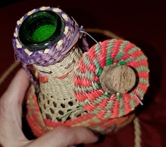 Vintage Wicker Demijohn Wine bottle Lady design w/neck strap made in Ecuador