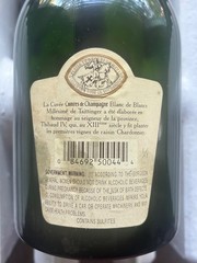 Empty bottle of 1993 Taittinger Comtes de Champagne Millésime Blanc de Blancs