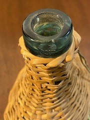 V. Levante Vintage Spanish Wicker-Covered Green Glass Demijohn Bottle