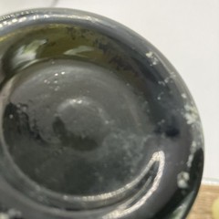Antique 8 1/4 inch Dark Olive/Green Glass Bottle. O on Bottom. Small chip