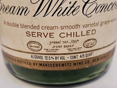 MANISCHEWITZ Cream White Concord grape wine, 4/5 quart bottle(empty). NY Kosher