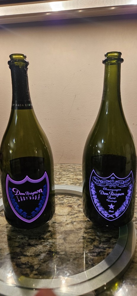 Two Dom Perognon Champagne Empty Bottles – Lady Gaga and 2006 Rose