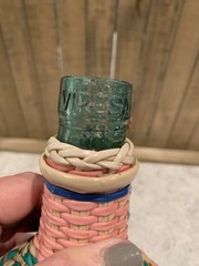 Vintage Green Viresa Glass Bottle Wrapped In Colorful Plastic Wicker 9.5” Tall
