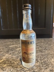 Meier’s Mini 3 Oz Wine Bottle Ohio Sauterne With Paper Label And Embossed Grapes