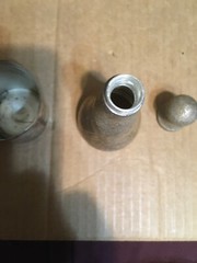 Used. Approx 7” Silver Plated by Parks Cuvée Speciale Premier Champagne Bottle