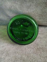 WIne World Vintage Small Green Glass Bottle 1976 embossed grapes screw top cap