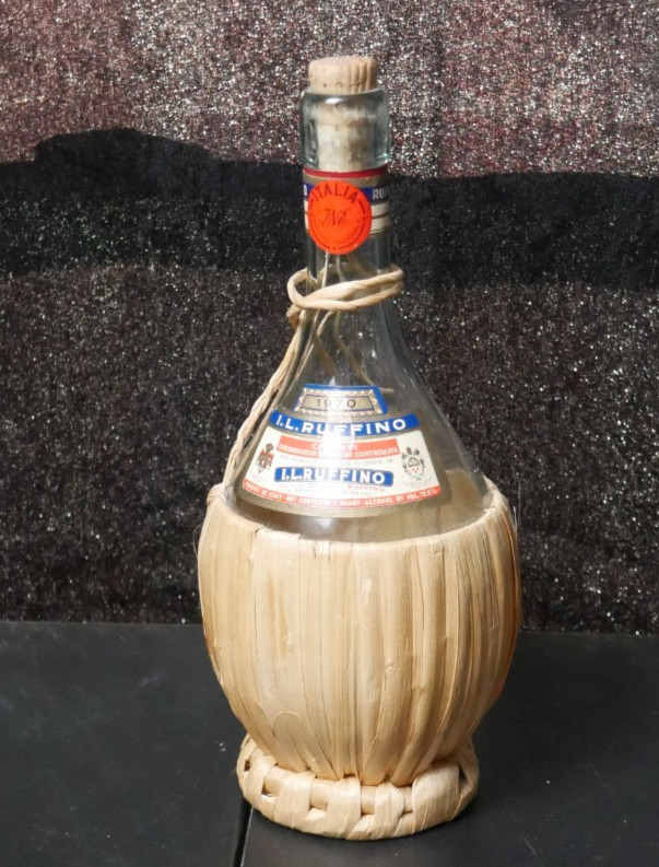 I.L. RUFFINO 1970 VTG WINE BOTTLE EMPTY WITH RATTAN WRAP AND CORK CAP