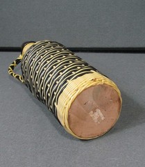 Vintage 70s Plastic Tube Weave Black & White Glass Bottle
