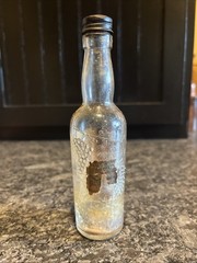Meier’s Mini 3 Oz Wine Bottle Ohio Sauterne With Paper Label And Embossed Grapes